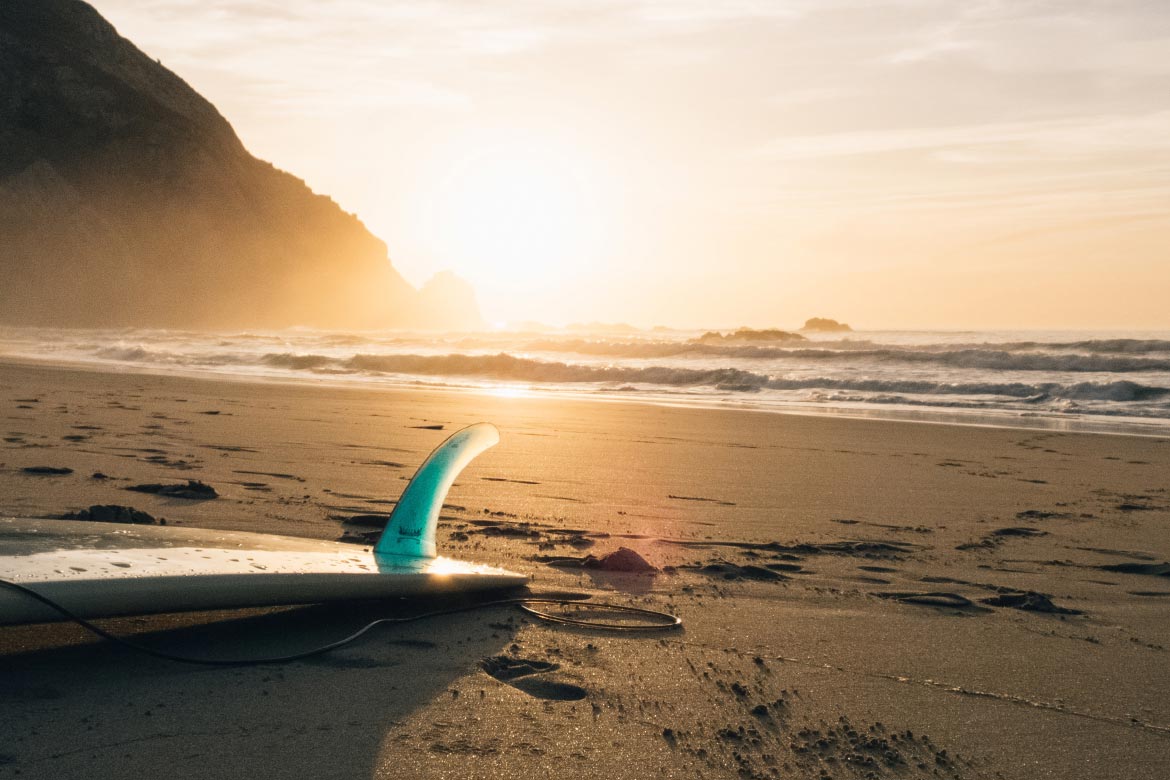 Surfboard Laying on Beach